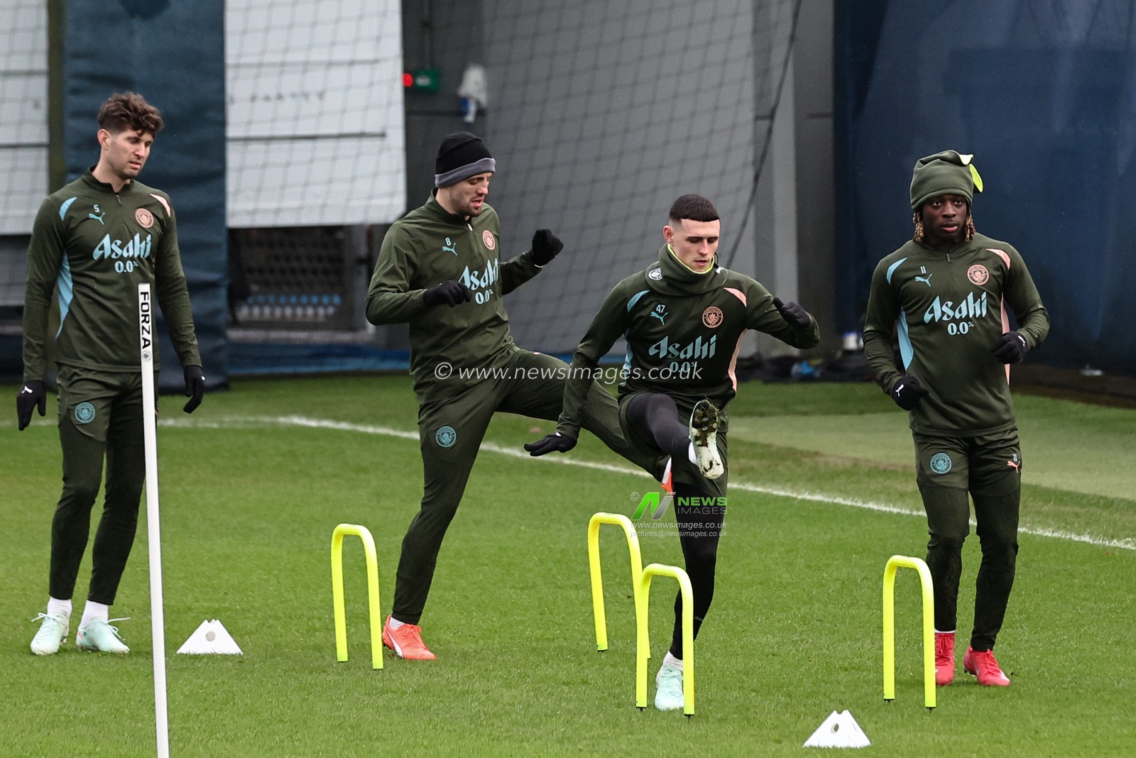 Phil Foden of Manchester City and JÃ©rÃ©my Doku of Manchester City during the UEFA Champions League Manchester City Training session at Etihad Campus, Manchester, United Kingdom, 10th February 2025

(Photo by Mark Cosgrove/News Images)