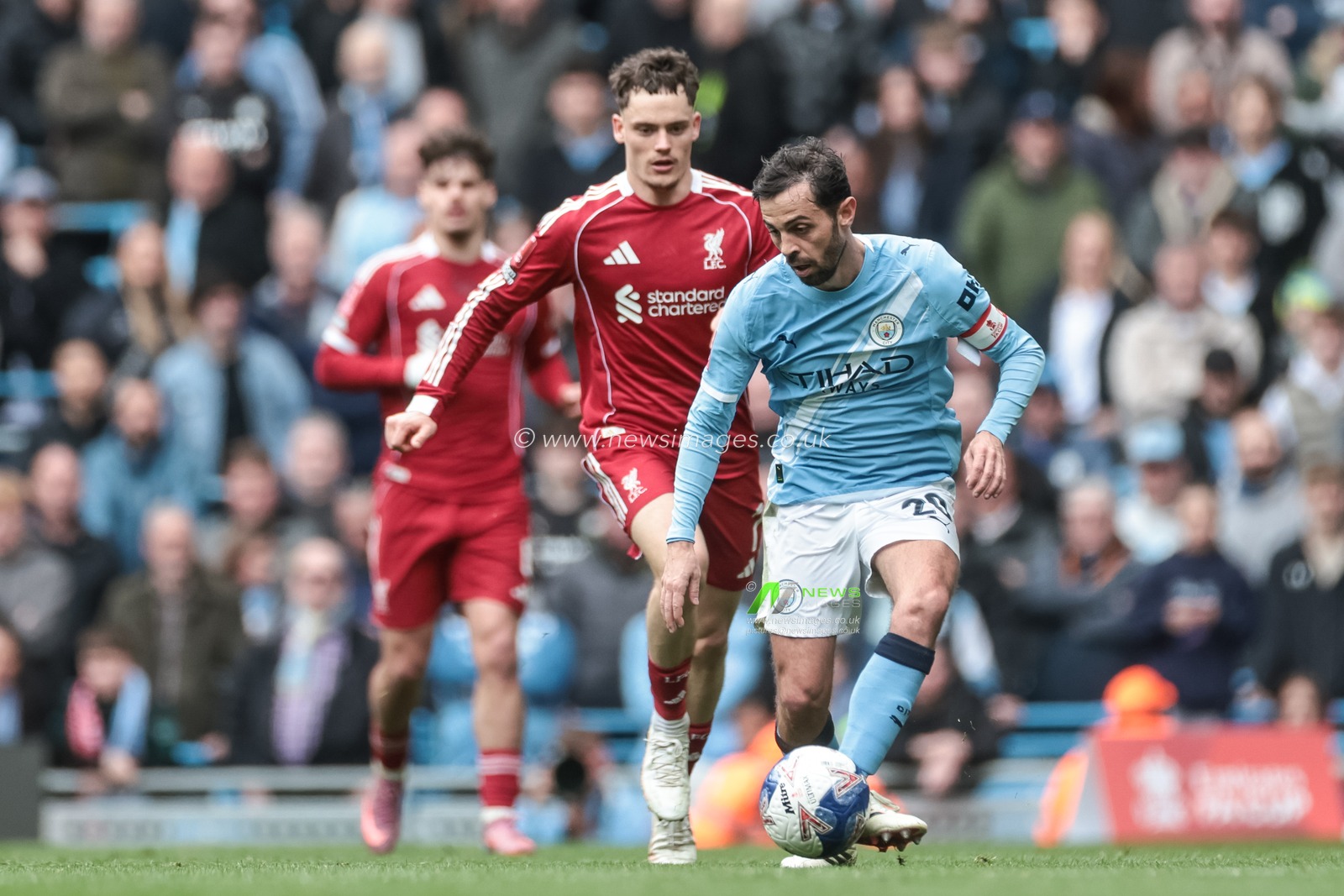 Bernardo Silva of Manchester City clears the ball up field during the Emirates FA Cup Quarter-Final match Manchester City vs Liverpool at Etihad Stadium, Manchester, United Kingdom on 04 April 2026

(Photo by Mark Cosgrove/News Images)