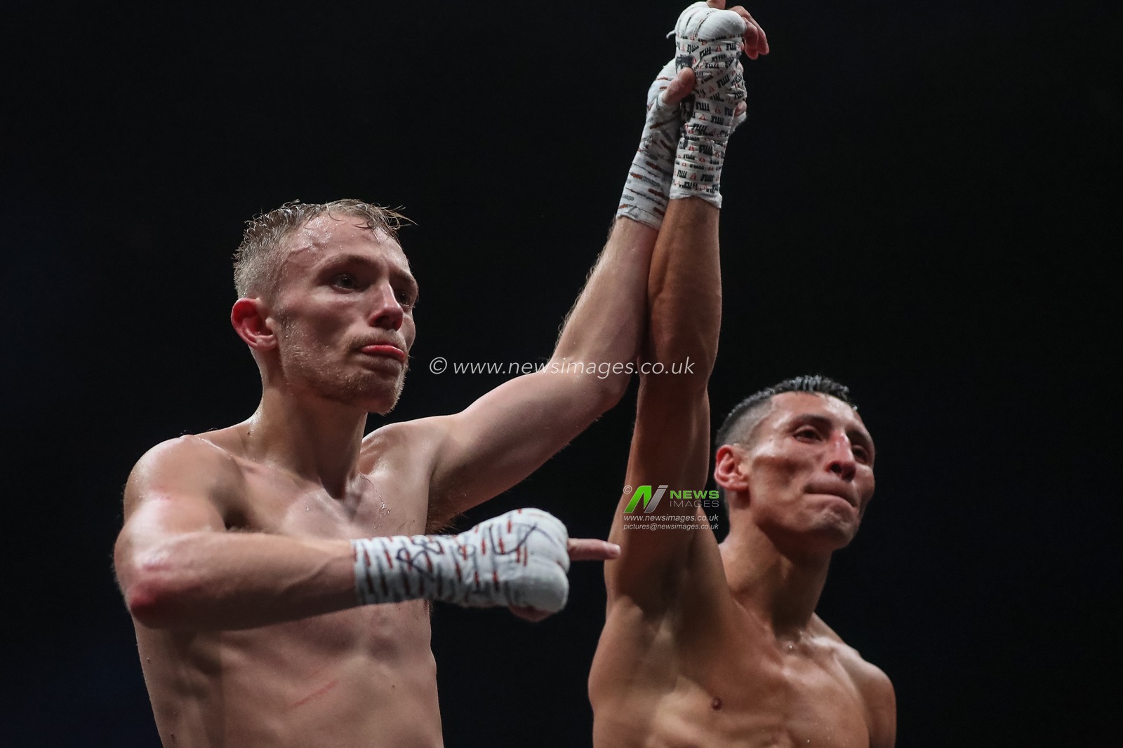Sunny Edwards and Felix Alvarado share a moment of respect after the Sunny Edwards vs Felix Alvarado card at Utilita Arena, Sheffield, United Kingdom, 11th November 2022

(Photo by Gareth Evans/News Images)