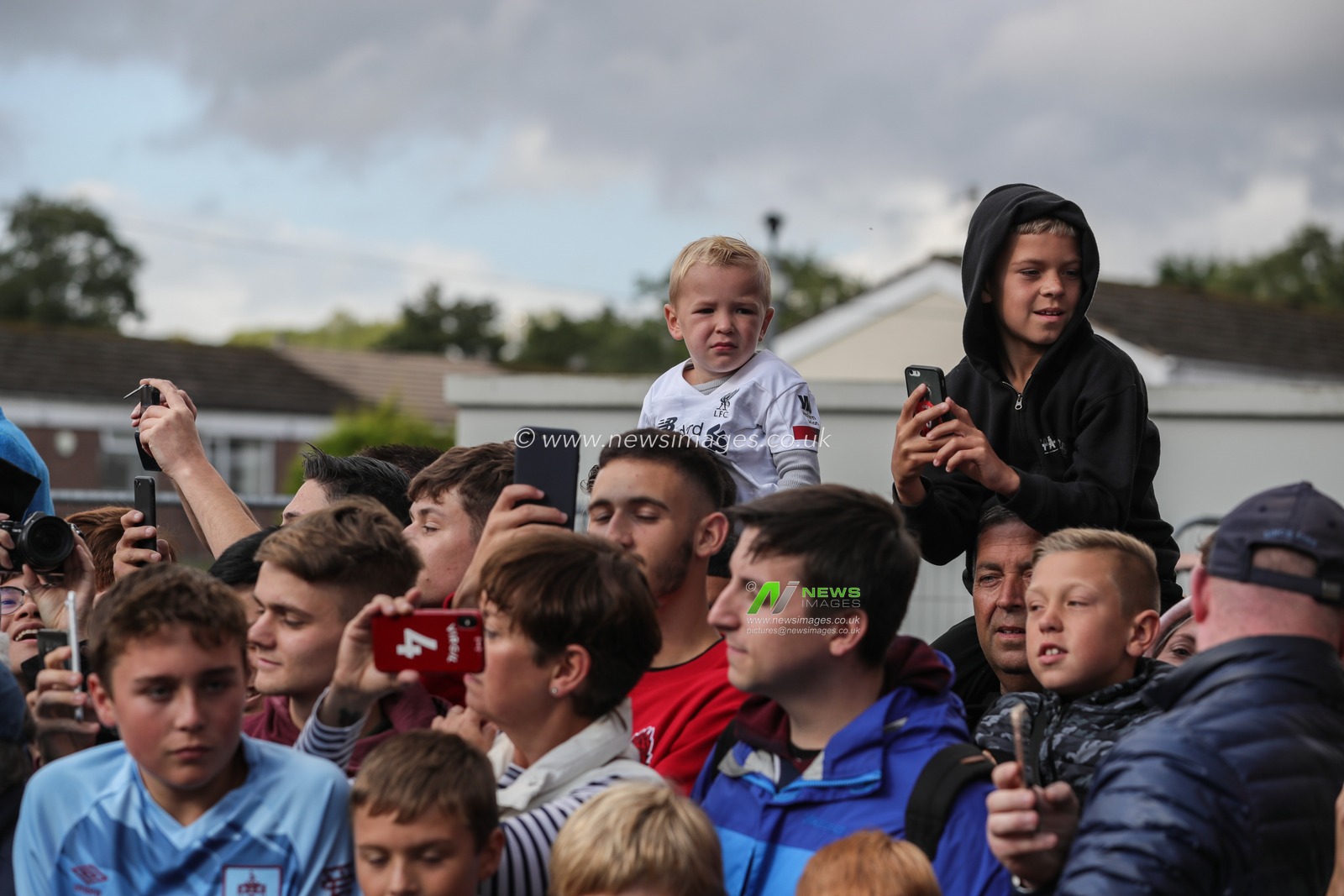 31st August 2019, Turf Moor, Burnley, England ; Premier League Football, Burnley vs Liverpool : A young Liverpool fan watches his team coach arrive

Credit: Mark Cosgrove/News Images

English Football League images are subject to DataCo Licence