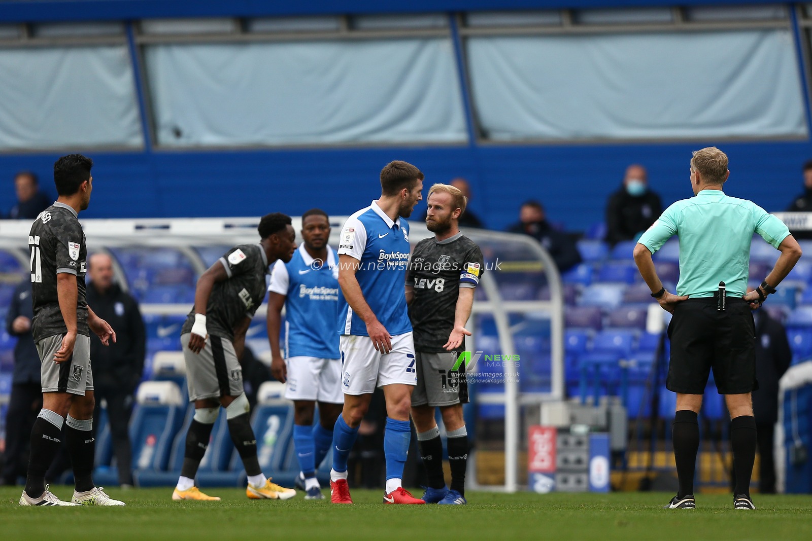Barry Bannan (10) of Sheffield Wednesday and Gary Gardner (20) of Birmingham City confront each other