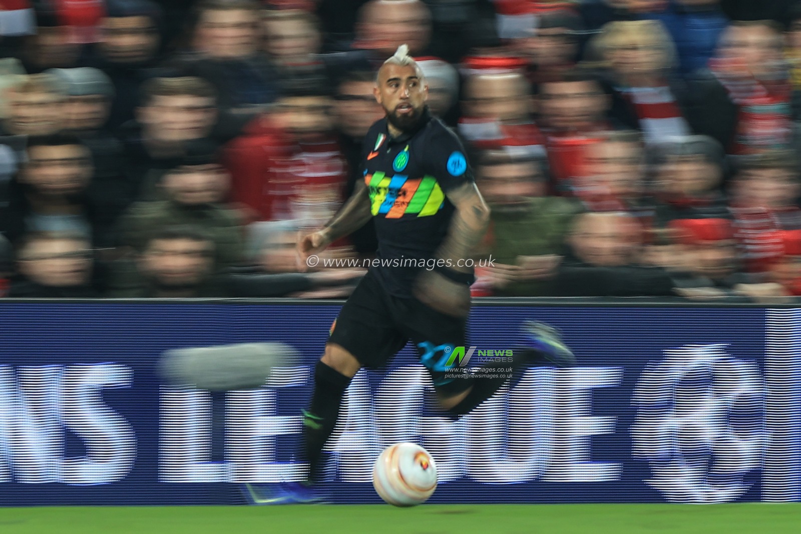 Arturo Vidal #22 of Inter Milan breaks with the ball