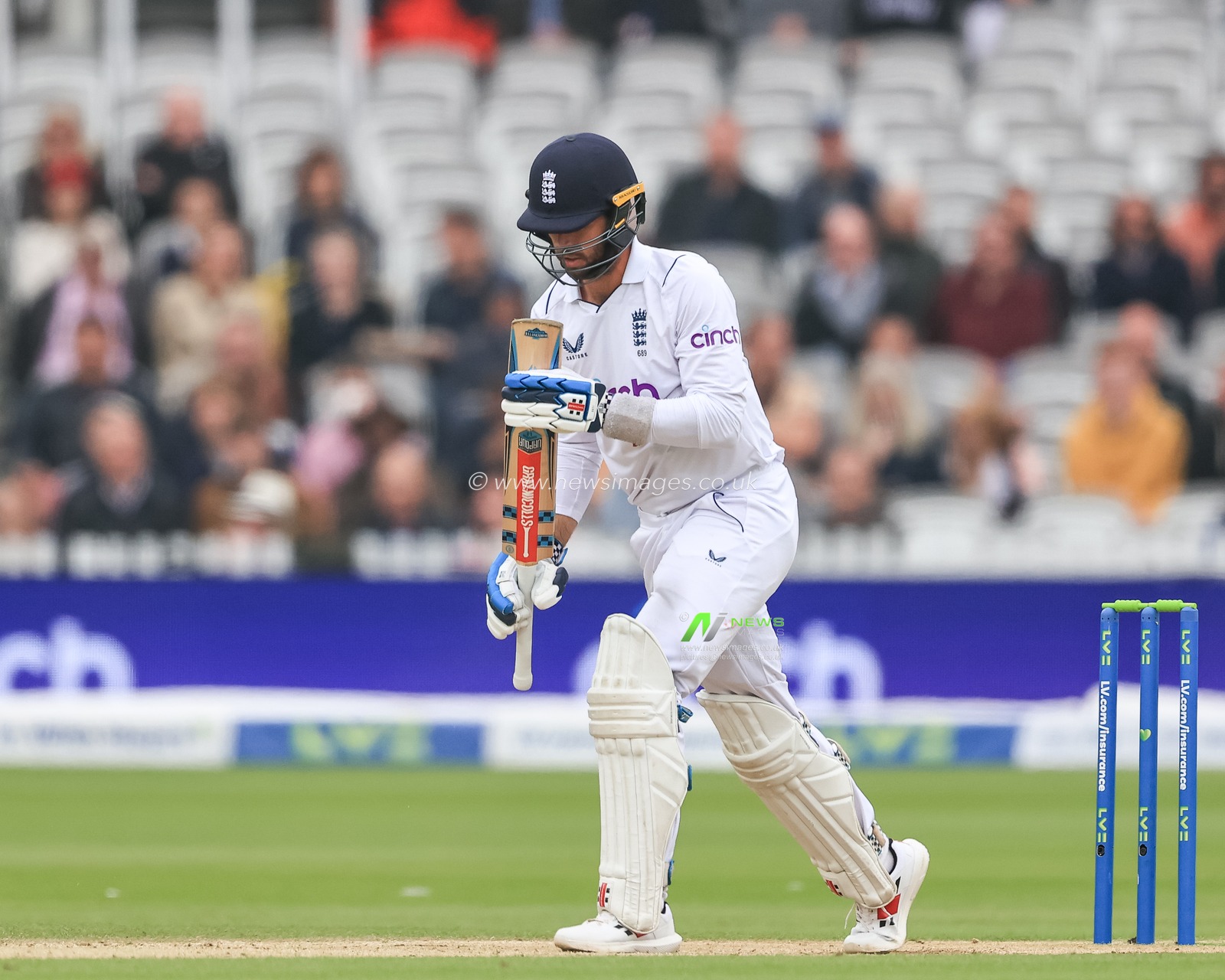 Ben Foakes of England inspects his bat