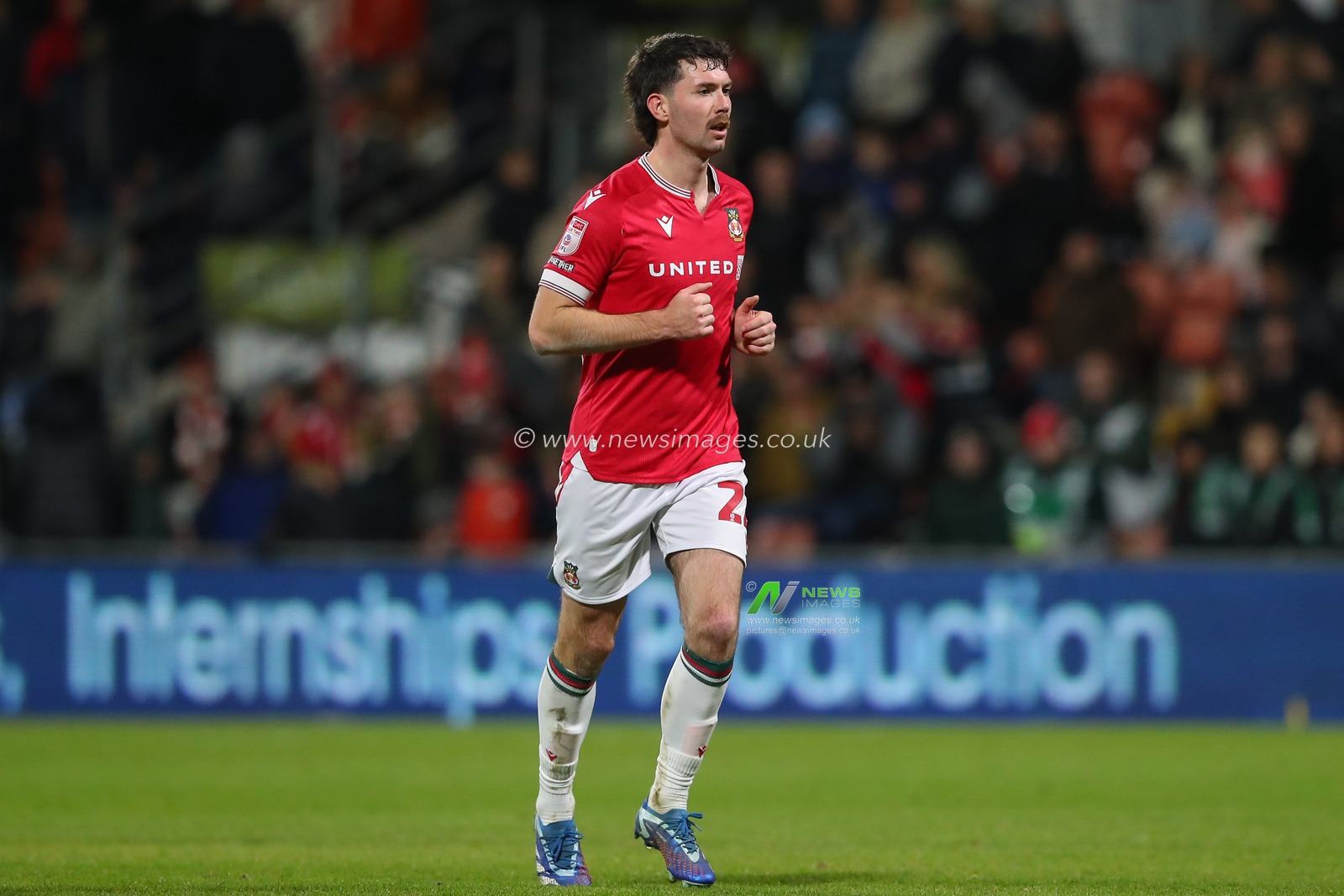 Thomas O'Connor #22 of Wrexham during the Sky Bet League 2 match Wrexham vs Newport County at SToK Cae Ras, Wrexham, United Kingdom, 23rd December 2023

(Photo by Gareth Evans/News Images)