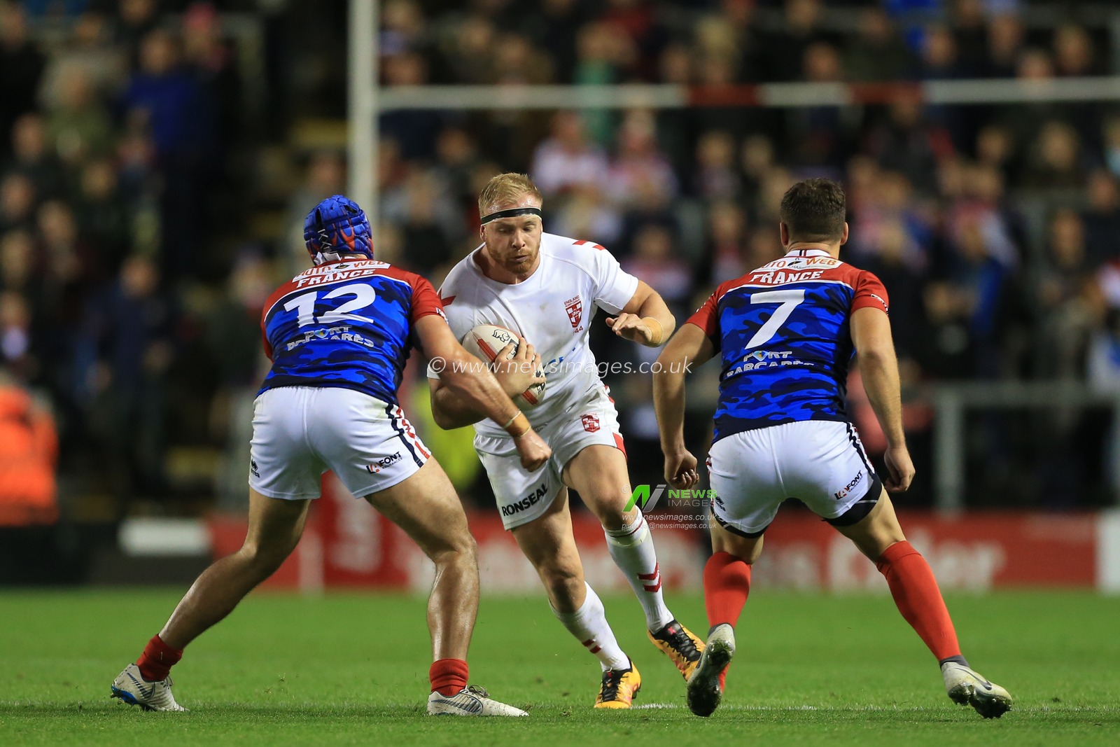 17th October 2018 , Leigh Sports Village,  Leigh, England;  Rugby League International, England v France ; Oliver Holmes of England  bursts through 


Credit:   Mark Cosgrove/News Images