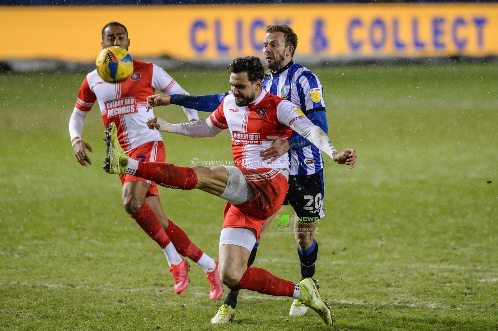 Ryan Tafazolli #6 of Wycombe Wanderers make clearance