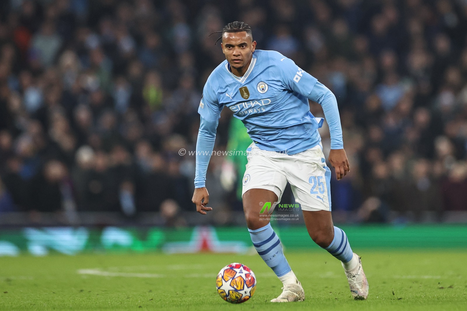 Manuel Akanji of Manchester City breaks with the ball during the UEFA Champions League match Manchester City vs F.C. Copenhagen at Etihad Stadium, Manchester, United Kingdom, 6th March 2024

(Photo by Mark Cosgrove/News Images)