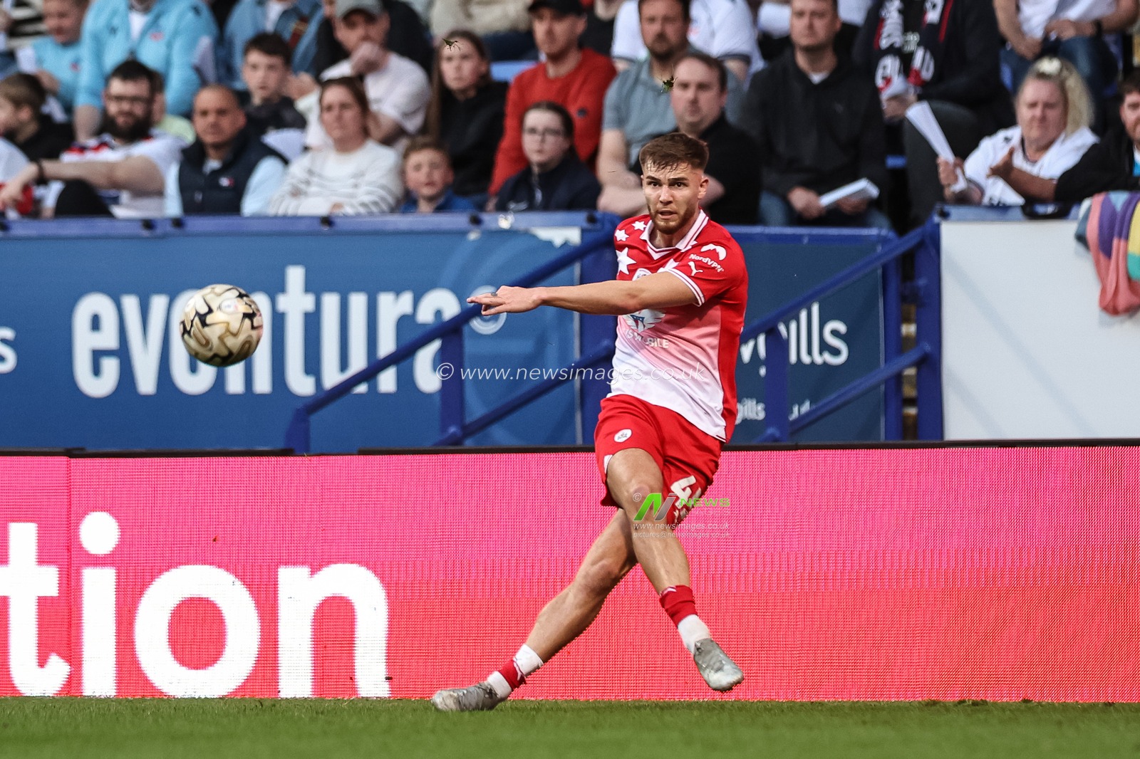 John Mcatee of Barnsley crosses the ball during the Sky Bet League 1 Play-offs Semi-final second leg match Bolton Wanderers vs Barnsley at Toughsheet Community Stadium, Bolton, United Kingdom, 7th May 2024

(Photo by Mark Cosgrove/News Images)