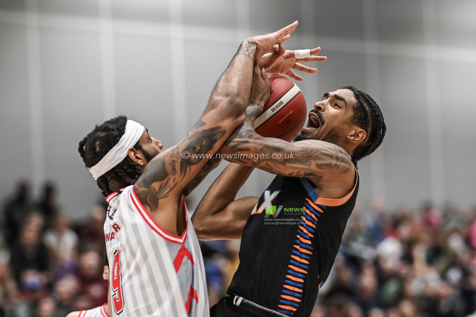 Cam Christon of Cheshire Phoenix and Mo Walker of Leicester Riders battle for the ball during the British Basketball Championship match Cheshire Phoenix vs Leicester Riders at Ellesmere Port Sports Village, Ellesmere Port, United Kingdom, 12th November 2023

(Photo by Craig Thomas/News Images)