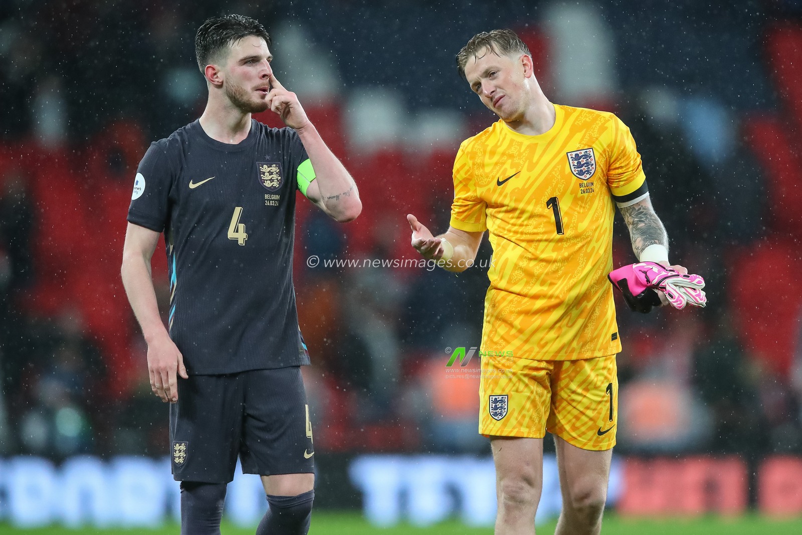 Declan Rice of England speaks to Jordan Pickford of England after the fan whistle during the International Friendly match England vs Belgium at Wembley Stadium, London, United Kingdom, 26th March 2024

(Photo by Gareth Evans/News Images)