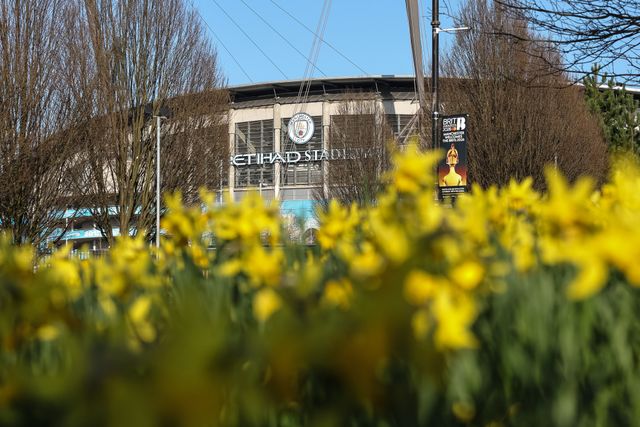 A general view of the Etihad Stadium from a bed of daffodils during the Premier League match Manchester City vs Nottingham Forest at Etihad Stadium, Manchester, United Kingdom on 04 March 2026

(Photo by Mark Cosgrove/News Images)