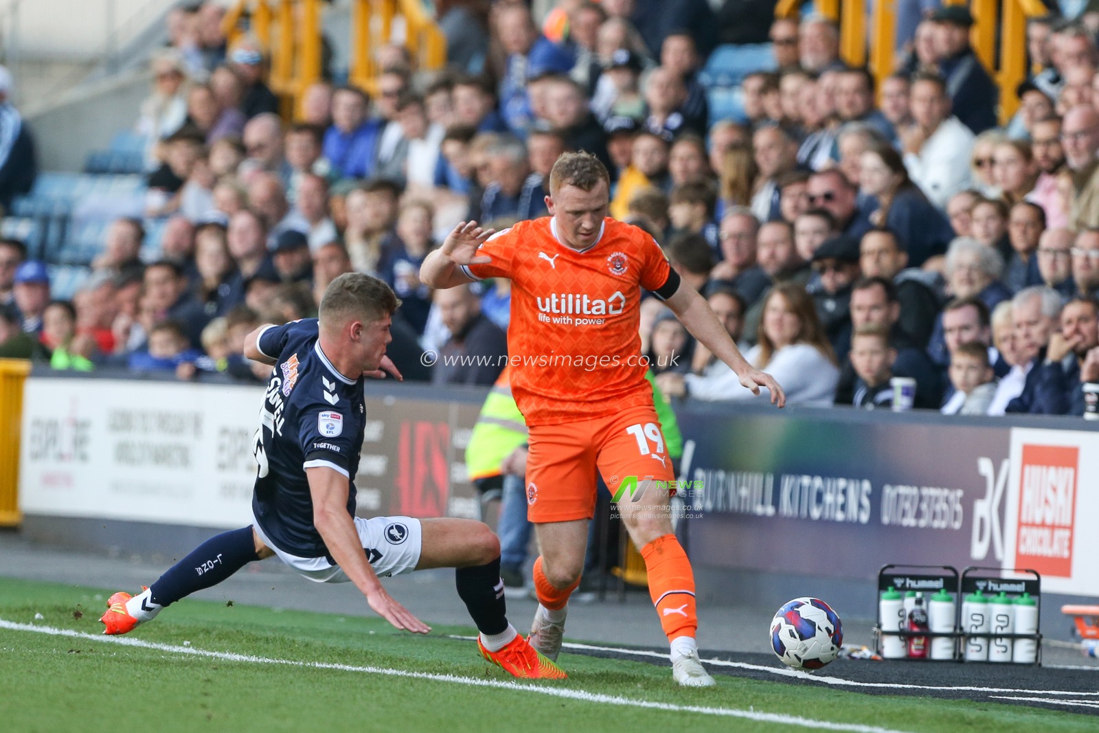 Shayne Lavery #19 of Blackpool is tackled by Charlie Cresswell #15 of Millwall during the Sky Bet Championship match Millwall vs Blackpool at The Den, London, United Kingdom, 17th September 2022

(Photo by Arron Gent/News Images)