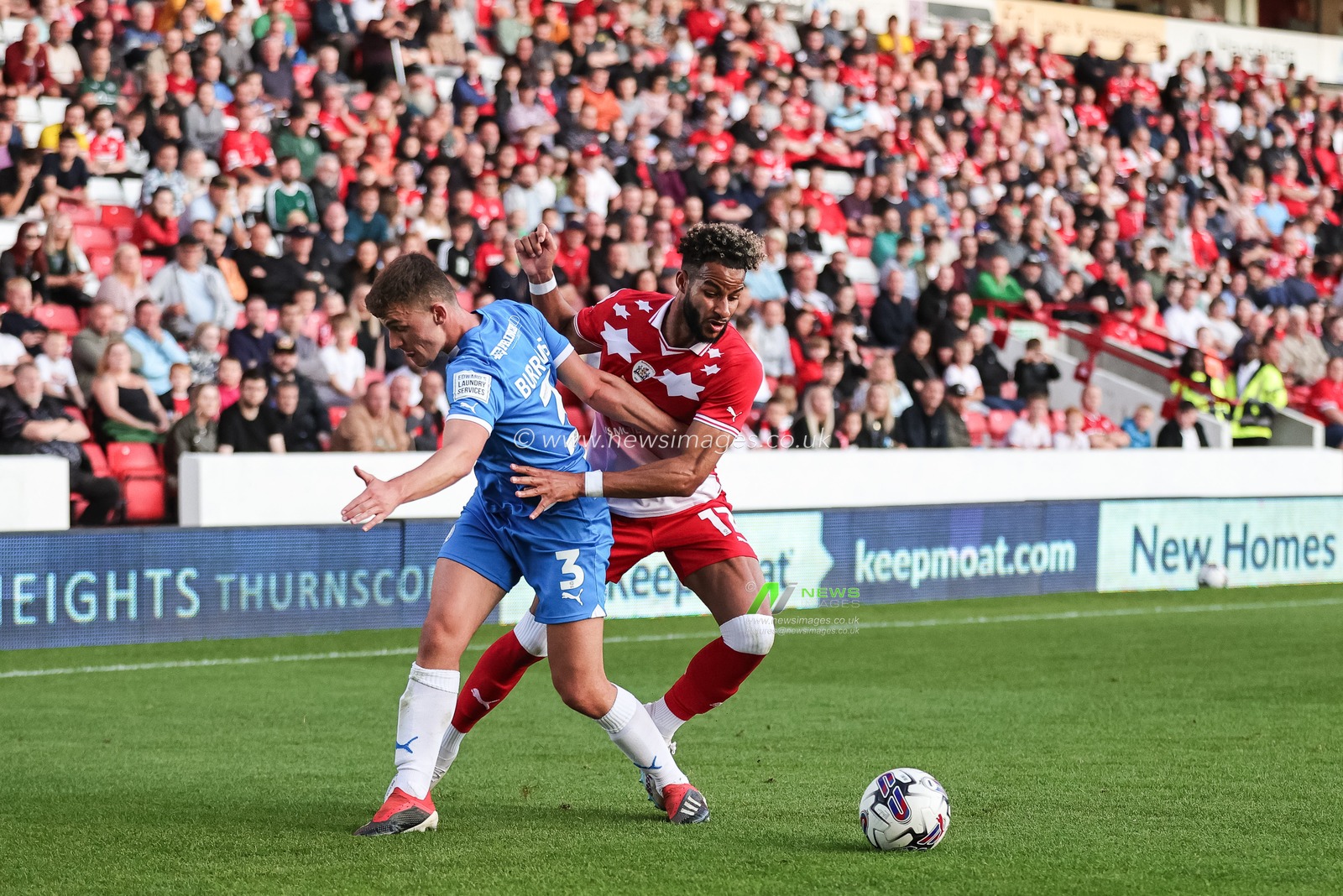 Barry Cotter #17 of Barnsley dribbles past Harrison Burrows #3 of Peterborough United during the Sky Bet League 1 match Barnsley vs Peterborough at Oakwell, Barnsley, United Kingdom, 15th August 2023

(Photo by Mark Cosgrove/News Images)