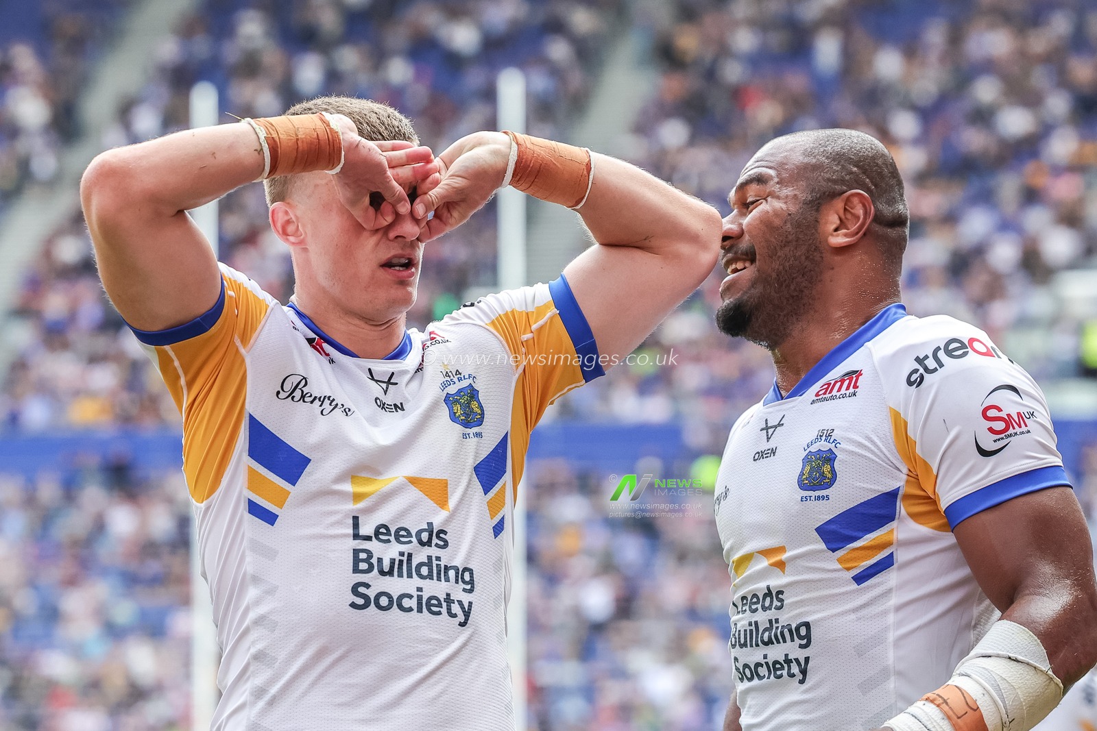Ash Handley of Leeds Rhinos celebrates his try with Maika Sivo of Leeds Rhinos during the Betfred Super League Magic Weekend match Leeds Rhinos vs Bradford Bulls at Hill Dickinson Stadium, Liverpool, United Kingdom on 05 July 2026

(Photo by Mark Cosgrove/News Images)