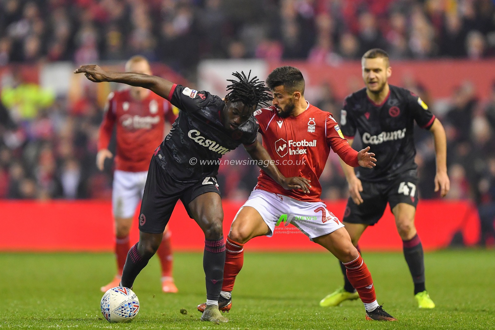 22nd January 2020, City Ground, Nottingham, England; Sky Bet Championship, Nottingham Forest v Reading : Tiago Silva (28) of Nottingham Forest battles with Pele (29) of Reading