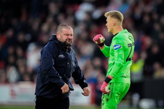 Blackburn Rovers goalkeeper Balazs Toth reacts after a fan invades the pitch to celebrate Yuki Ohashi of Blackburn Rovers scoring a goal to make it 0-2  during the Sky Bet Championship match Sheffield United vs Blackburn Rovers at Bramall Lane, Sheffield, United Kingdom on 22 April 2026

(Photo by Maynard Manyowa/News Images)