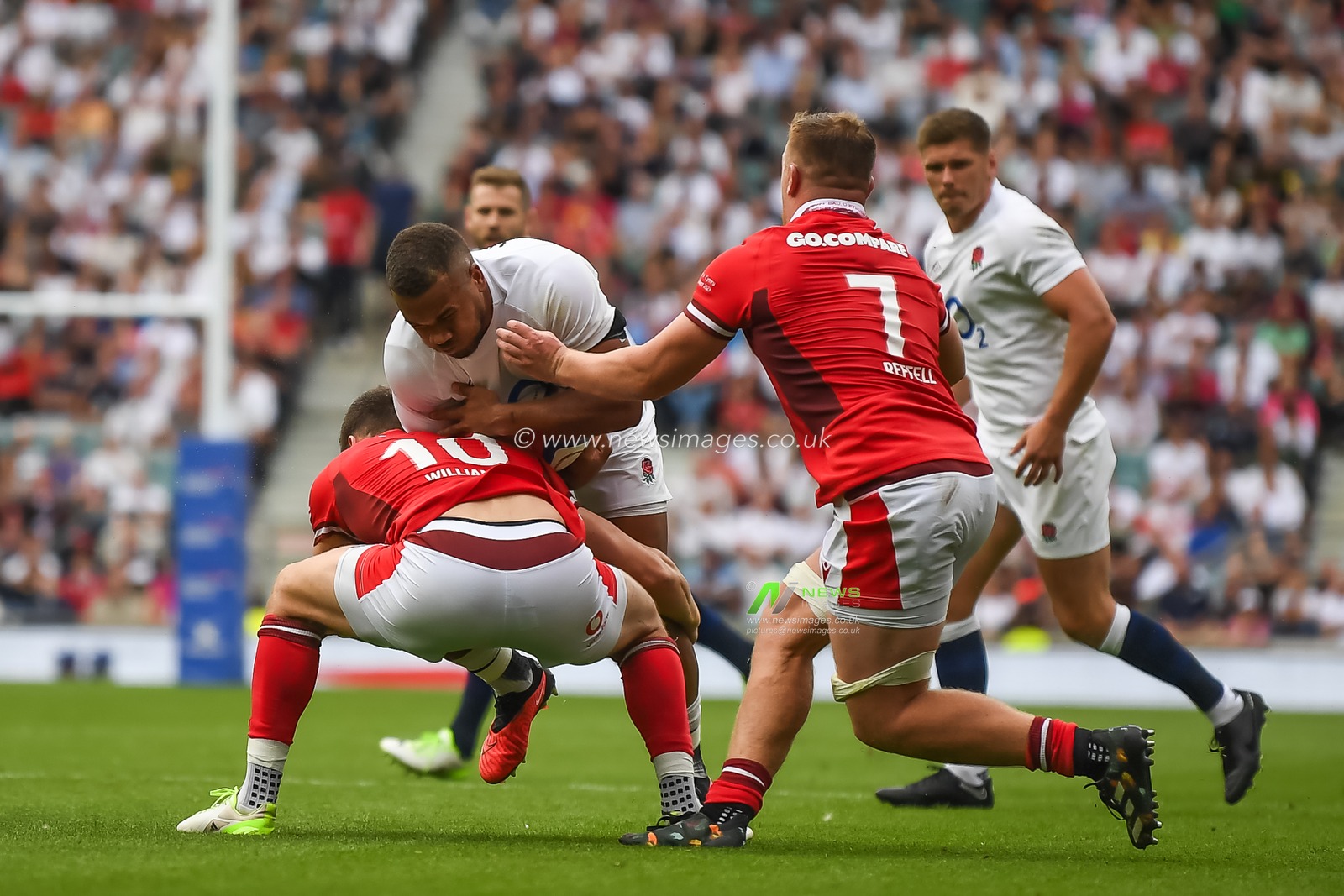 Ollie Lawrence of England is tackled by Owen Williams of Wales during the 2023 Summer Series match England vs Wales at Twickenham Stadium, Twickenham, United Kingdom, 12th August 2023

(Photo by Mike Jones/News Images)