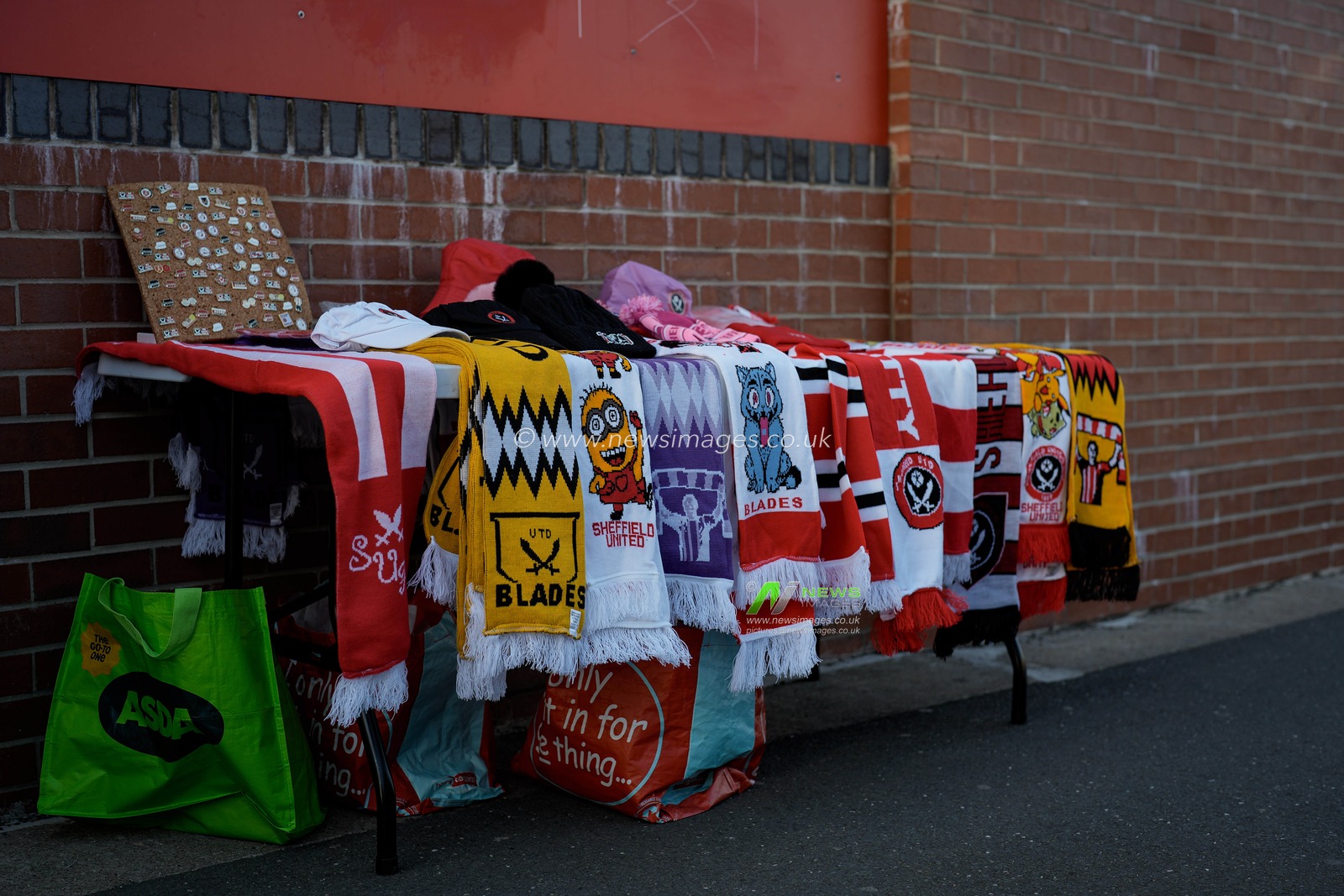 Club merchandise like scarfs and hats sold by vendors outside the stadium during the Sky Bet Championship match Sheffield United vs Blackburn Rovers at Bramall Lane, Sheffield, United Kingdom on 22 April 2026

(Photo by Maynard Manyowa/News Images)