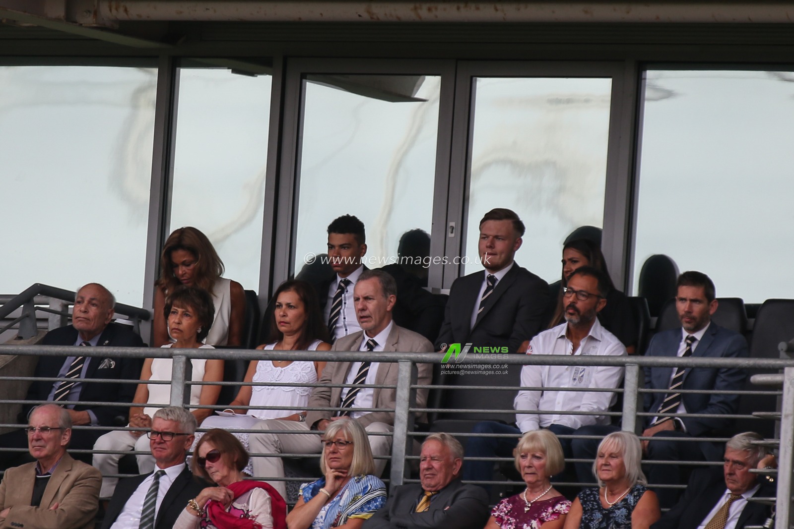 The Allam family watch from the stands