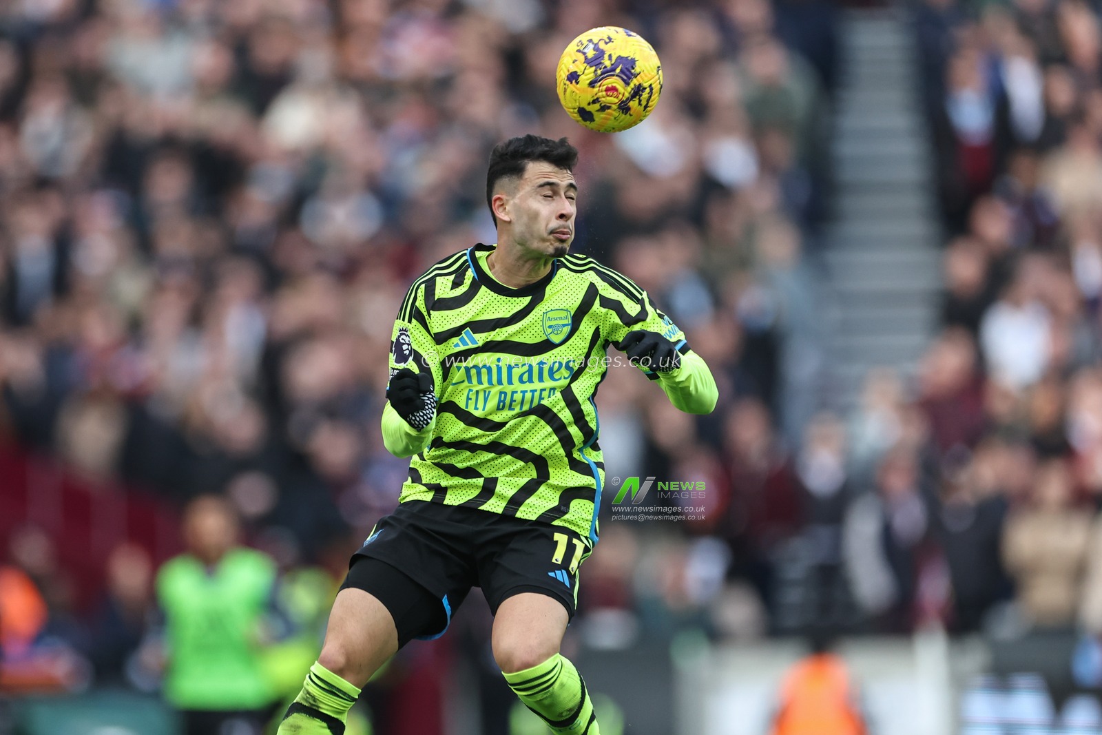 Gabriel Martinelli of Arsenal jumps up to win the high ball during the Premier League match West Ham United vs Arsenal at London Stadium, London, United Kingdom, 11th February 2024

(Photo by Mark Cosgrove/News Images)
