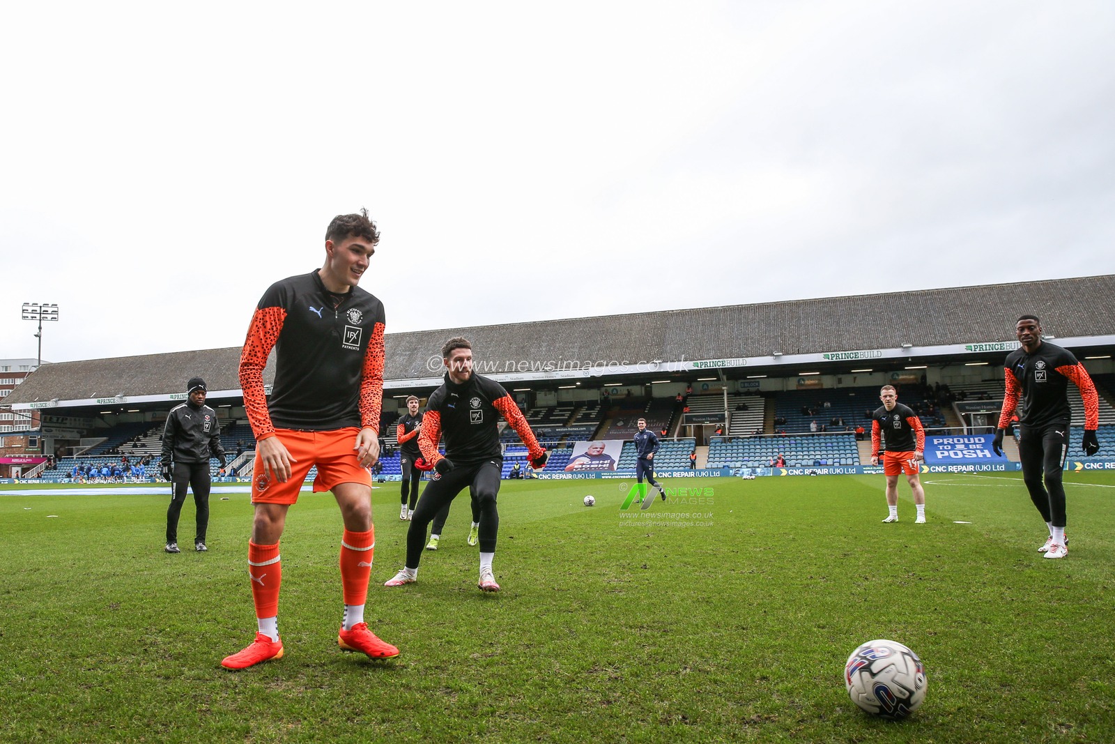Blackpool players during the pre-game warm up ahead of the Sky Bet League 1 match Peterborough United vs Blackpool at Weston Homes Stadium, Peterborough, United Kingdom, 17th February 2024

(Photo by Gareth Evans/News Images)