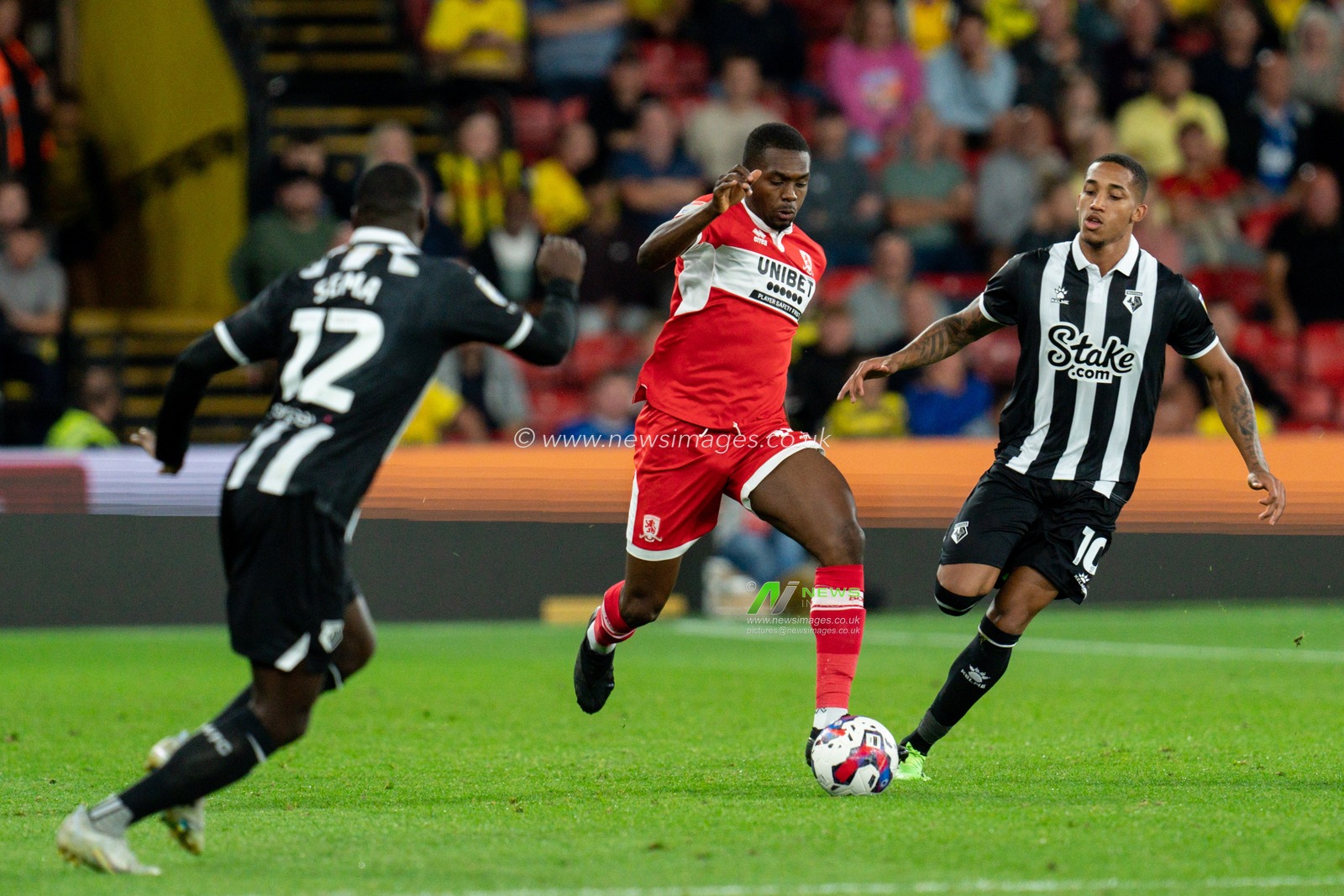 Anfernee Dijksteel #15 of Middlesbrough battle for the ball JoÃ£o Pedro #10 of Watford and Ken Sema #12 of Watford