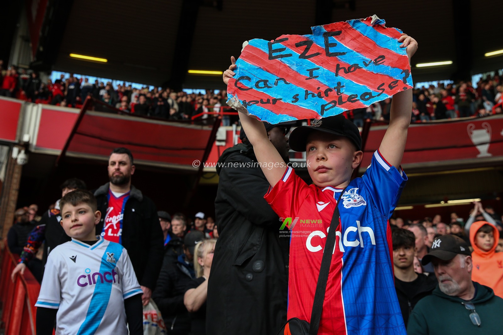 A young fan with a sign asking for Eberechi Eze of Crystal Palace shirt during the Premier League match Nottingham Forest vs Crystal Palace at City Ground, Nottingham, United Kingdom, 30th March 2024

(Photo by Gareth Evans/News Images)