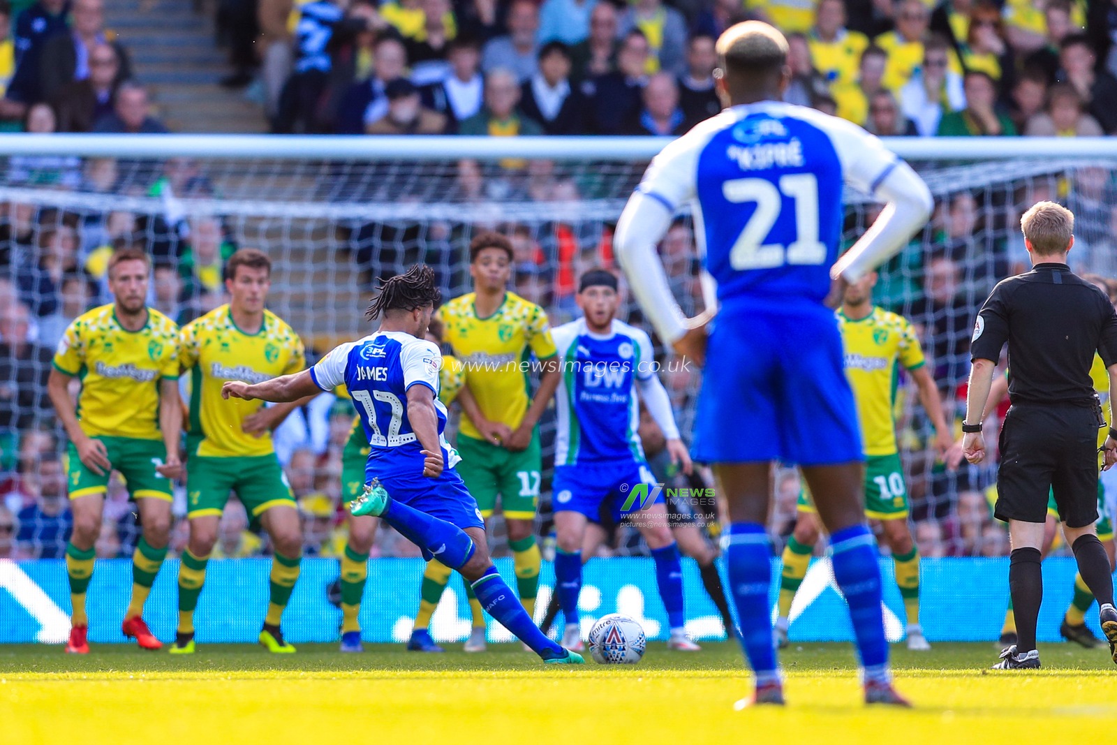 29th September 2018, Carrow Road, Norfolk, England; Sky Bet Championship, Norwich City v Wigan Athletic ; Reece James (12) of Wigan Athletic takes a free kick.

Credit:   Georgie Kerr/News Images

English Football League images are subject to DataCo Licence