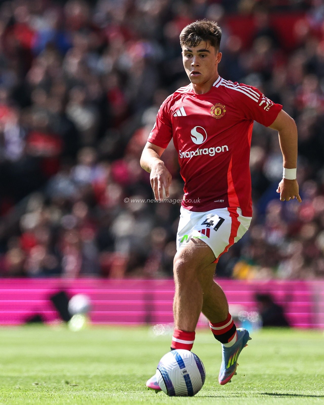 Harry Amass of Manchester United goes forward with the ball during the Premier League match Manchester United vs Wolverhampton Wanderers at Old Trafford, Manchester, United Kingdom, 20th April 2025

(Photo by Mark Cosgrove/News Images)