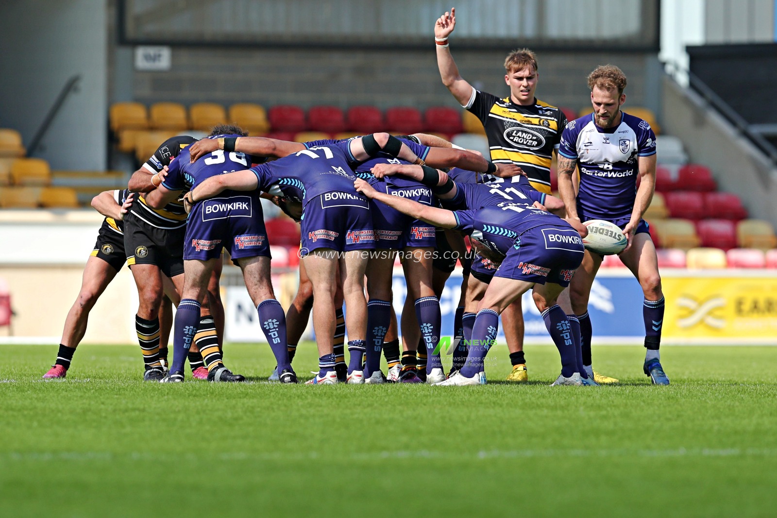 Both teams form a scrum during the Betfred Championship match York City Knights vs Featherstone Rovers at LNER Community Stadium, York, United Kingdom, 29th June 2025

(Photo by Sam Eaden/News Images)