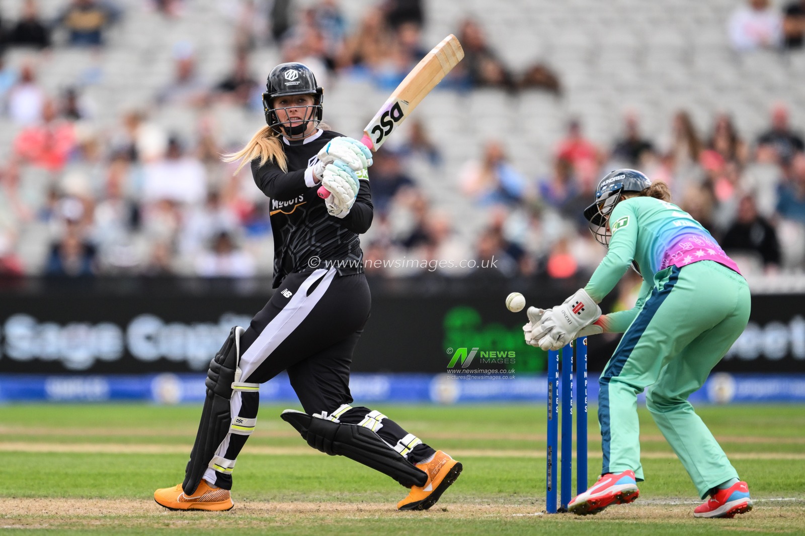 Sophie Ecclestone of Manchester Orignals swings for the ball but misses during the The Hundred match Manchester Originals Women vs Oval Invincibles Women at Old Trafford, Manchester, United Kingdom, 6th August 2024

(Photo by Craig Thomas/News Images)