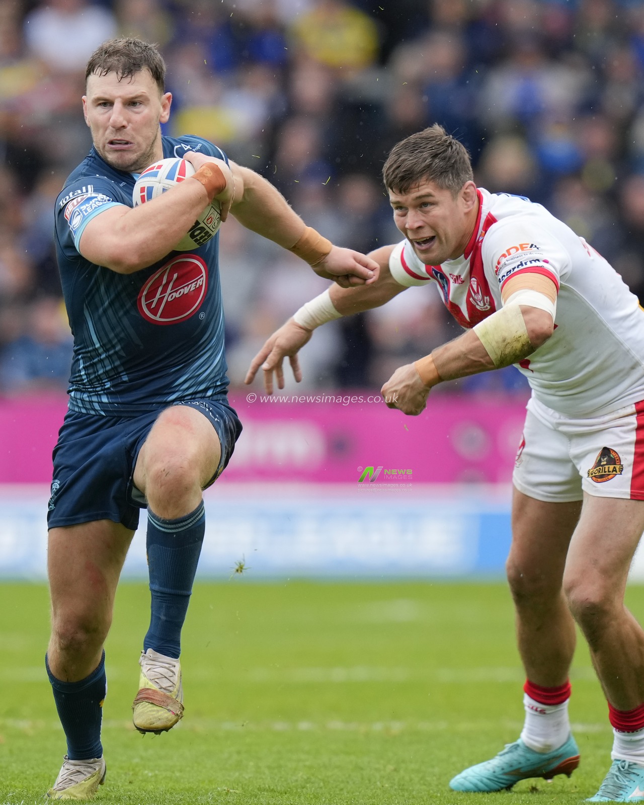 Jonny Lomax #6 of St. Helens makes a break past Louie McCarthy-Scarsbrook #15 of St. Helens during the Betfred Super League Eliminator match St Helens vs Warrington Wolves at Totally Wicked Stadium, St Helens, United Kingdom, 30th September 2023

(Photo by Steve Flynn/News Images)
