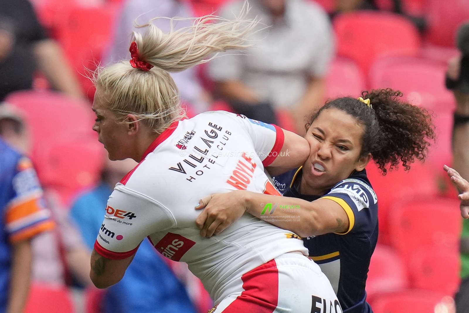 Eboni Partington #3 of St. Helens makes a break past Tara Moxon #20 of Leeds Rhinos during the Betfred Womens Challenge Cup Final match Leeds Rhinos vs St Helens at Wembley Stadium, London, United Kingdom, 12th August 2023

(Photo by Steve Flynn/News Images)