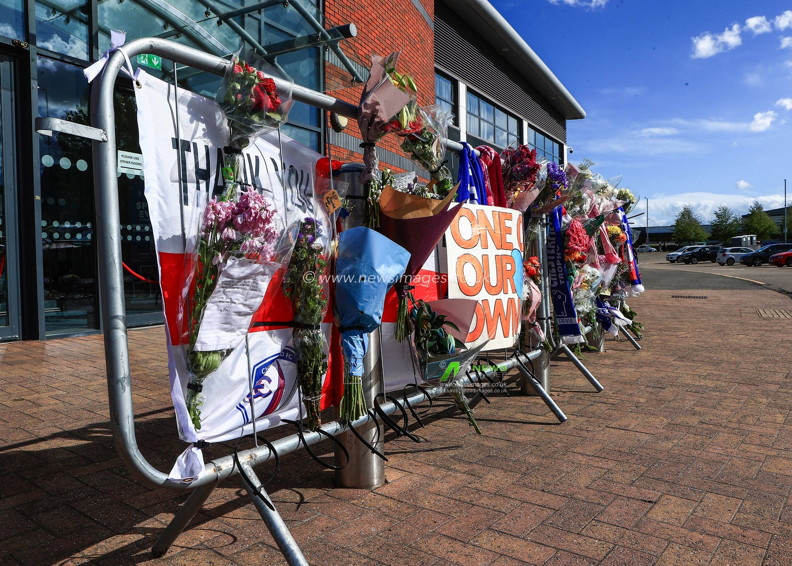 Chesterfield fans lay flowers as they pay their respects as Chesterfield owner Phil Kirk dies aged 59 after a short illness at SMH Group Stadium, Chesterfield, United Kingdom, 26th August 2025

(Photo by Richard Bierton/News Images)