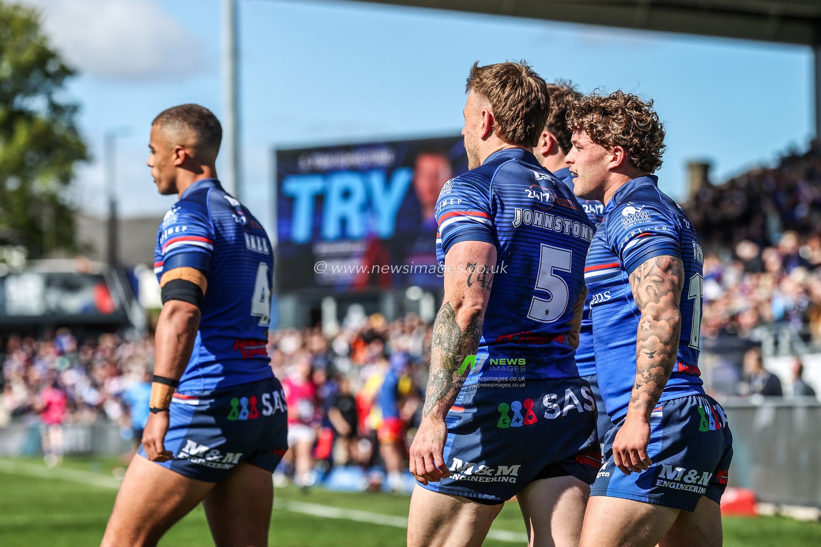 Tom Johnstone of Wakefield Trinity celebrates his try during the Betfred Super League round 8 match Wakefield Trinity vs Bradford Bulls at DIY Kitchens Stadium, Wakefield, United Kingdom on 18 April 2026

(Photo by Alfie Cosgrove/News Images)