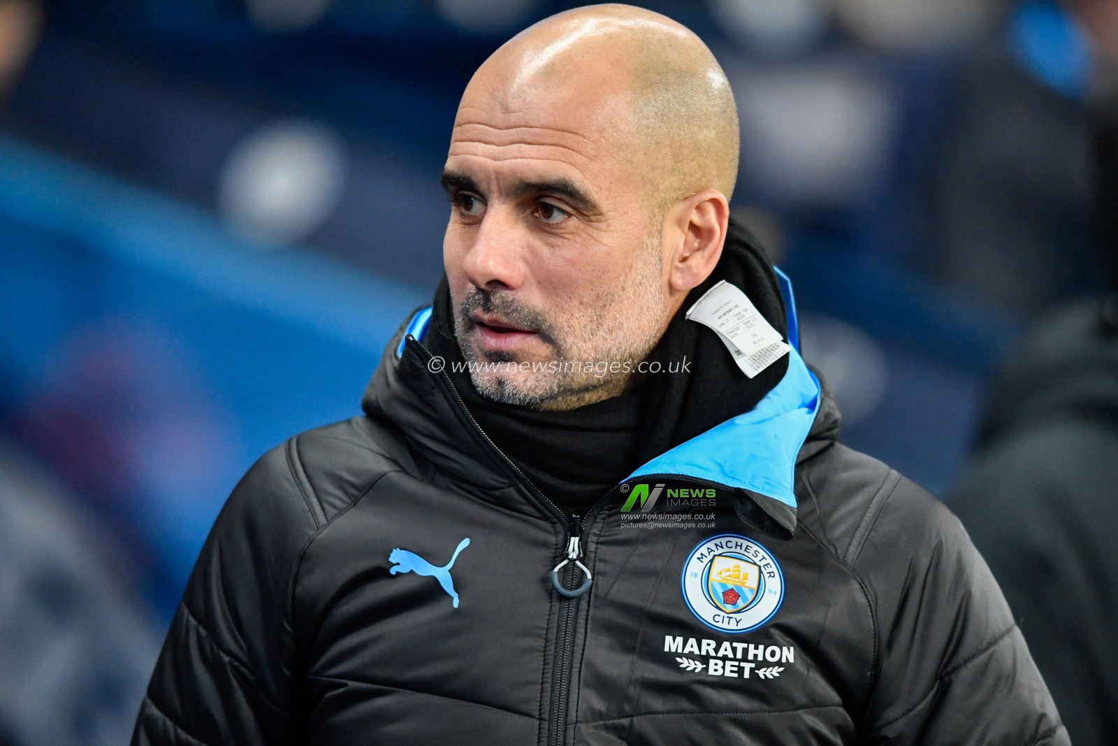 4th January 2020, Etihad Stadium, Manchester, England; Emirates FA Cup, Manchester City v Port Vale : Pep Guardiola, Manager of Manchester City enters the dug out

Credit: Simon Whitehead/News Images