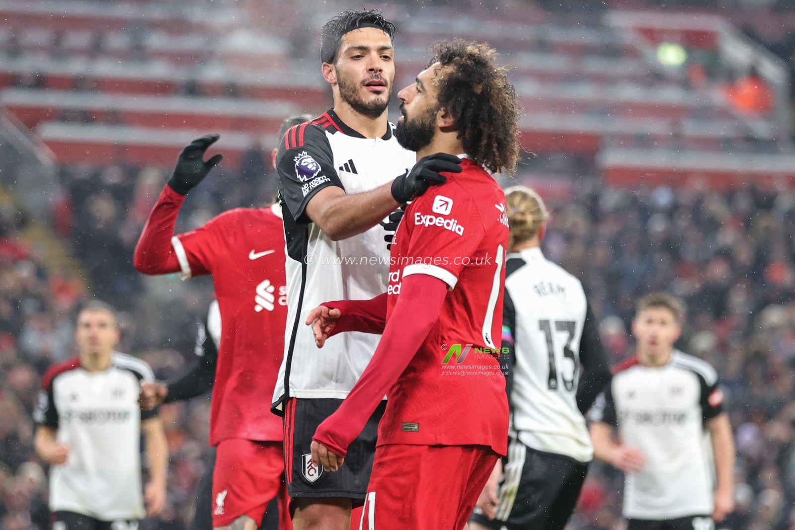 RaÃºl JimÃ©nez #7 of Fulham consoles Mohamed Salah #11 of Liverpool after a missed chance on goal during the Premier League match Liverpool vs Fulham at Anfield, Liverpool, United Kingdom, 3rd December 2023

(Photo by Mark Cosgrove/News Images)