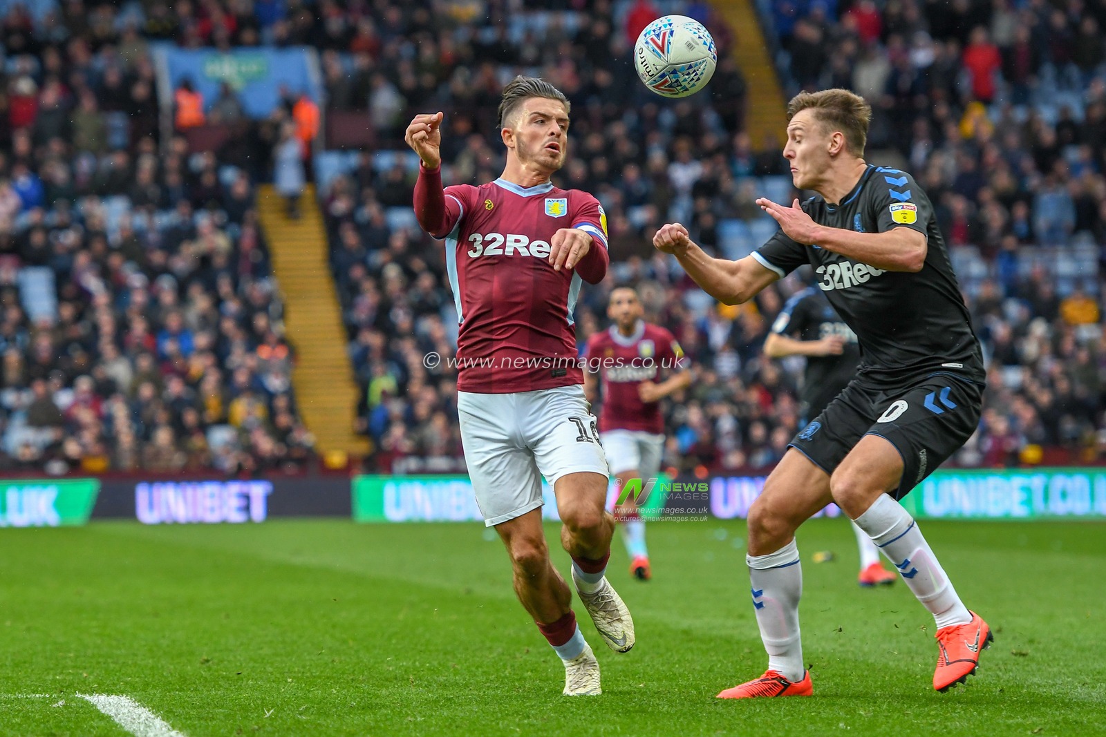 16th March 2019, Villa Park, Birmingham, England ; Sky Bet Championship, Aston Villa v Middlesbrough : Jack Grealish (10) of Aston Villa heads the ball under pressure from Dael Fry (20) of Middlesbrough 

Credit: Gareth Dalley/News Images

English Football League images are subject to DataCo Licence
