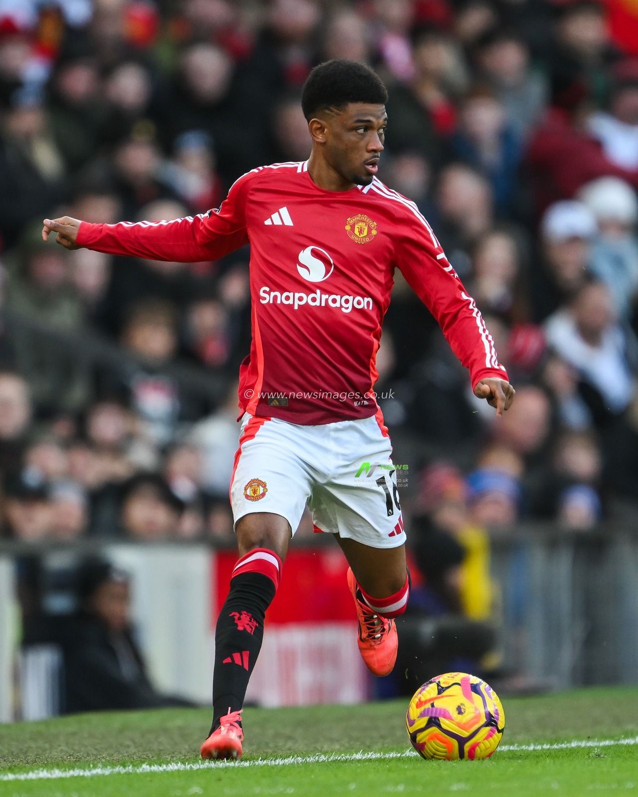 Amad Diallo of Manchester United makes a break with the ball during the Premier League match Manchester United vs Bournemouth at Old Trafford, Manchester, United Kingdom, 22nd December 2024

(Photo by Craig Thomas/News Images)