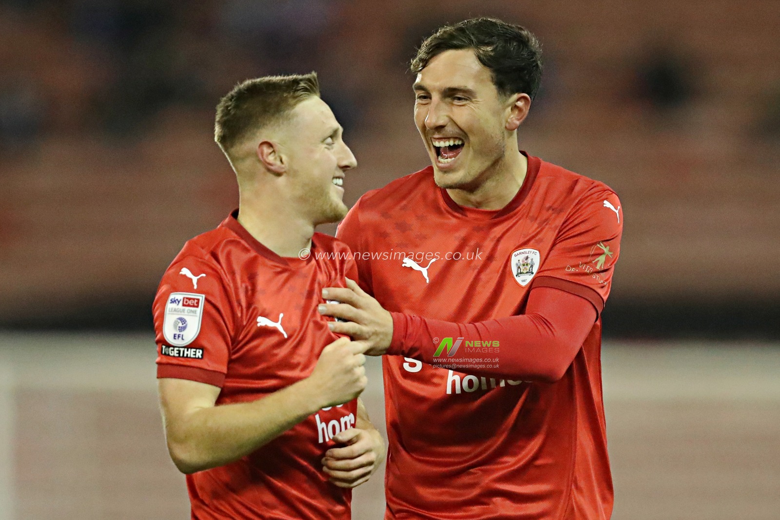 Barnsley's Davis Keillor-Dunn celebrates his goal with Josh Earl during the Sky Bet League 1 match Barnsley vs Reading at Oakwell, Barnsley, United Kingdom, 26th November 2024

(Photo by Sam Eaden/News Images)