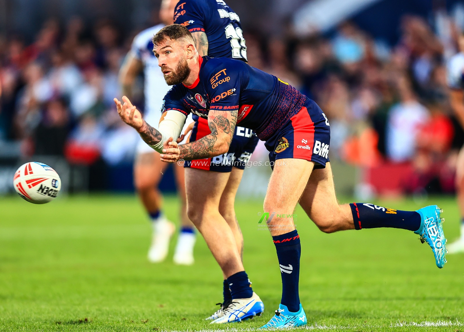 Daryl Clark of St. Helens passes the ball during the Betfred Super League round 21 match Wakefield Trinity vs St Helens at DIY Kitchens Stadium, Wakefield, United Kingdom, 8th August 2025

(Photo by Richard Bierton/News Images)