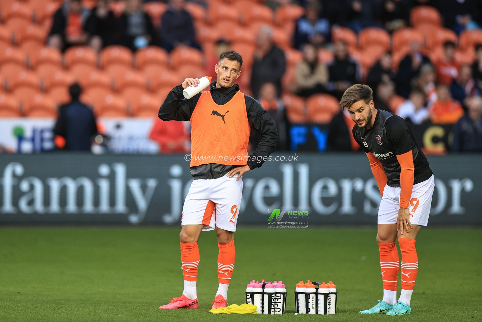 Jerry Yates #9 of Blackpool and Luke Garbutt #29 of Blackpool having an Ipro drink