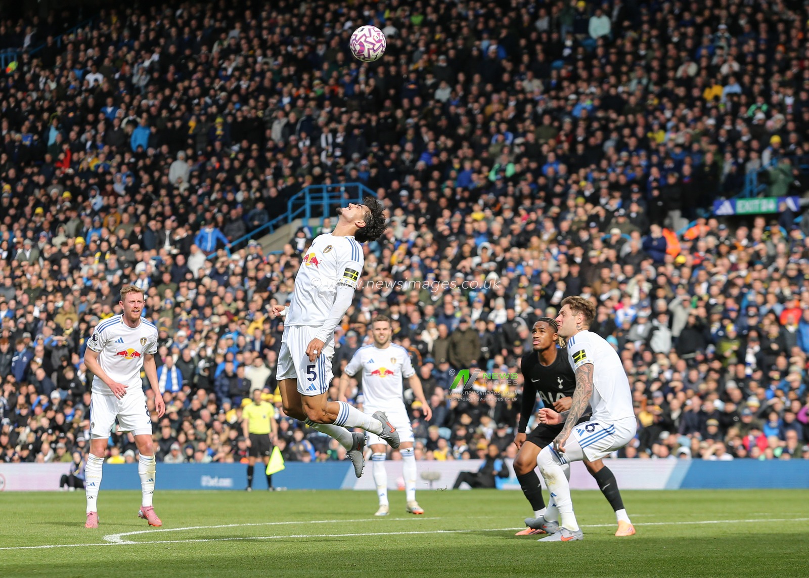 Pascal Struijk of Leeds United jumps up to win the high ball during the Premier League match Leeds United vs Tottenham Hotspur at Elland Road, Leeds, United Kingdom, 4th October 2025

(Photo by Richard Bierton/News Images)