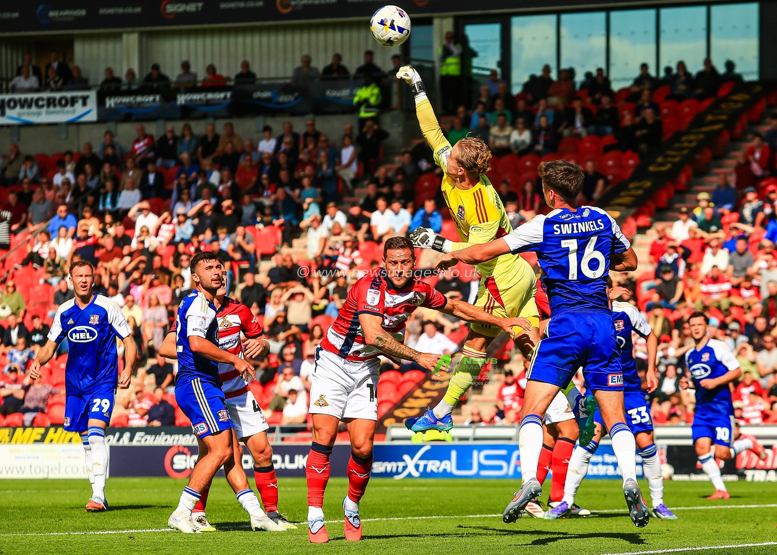 Joe Whitworth Exeter City goalkeeper punches the ball clear during the Sky Bet League 1 match Doncaster Rovers vs Exeter City at Eco-Power Stadium, Doncaster, United Kingdom, 2nd August 2025

(Photo by Richard Bierton/News Images)