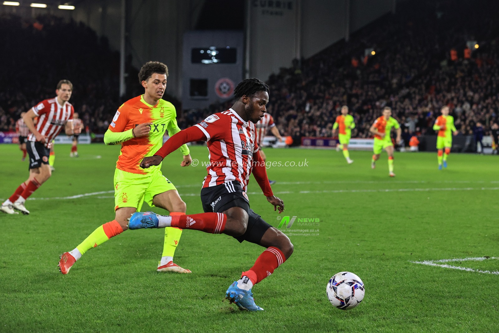 Femi Seriki #40 of Sheffield United crosses the ball