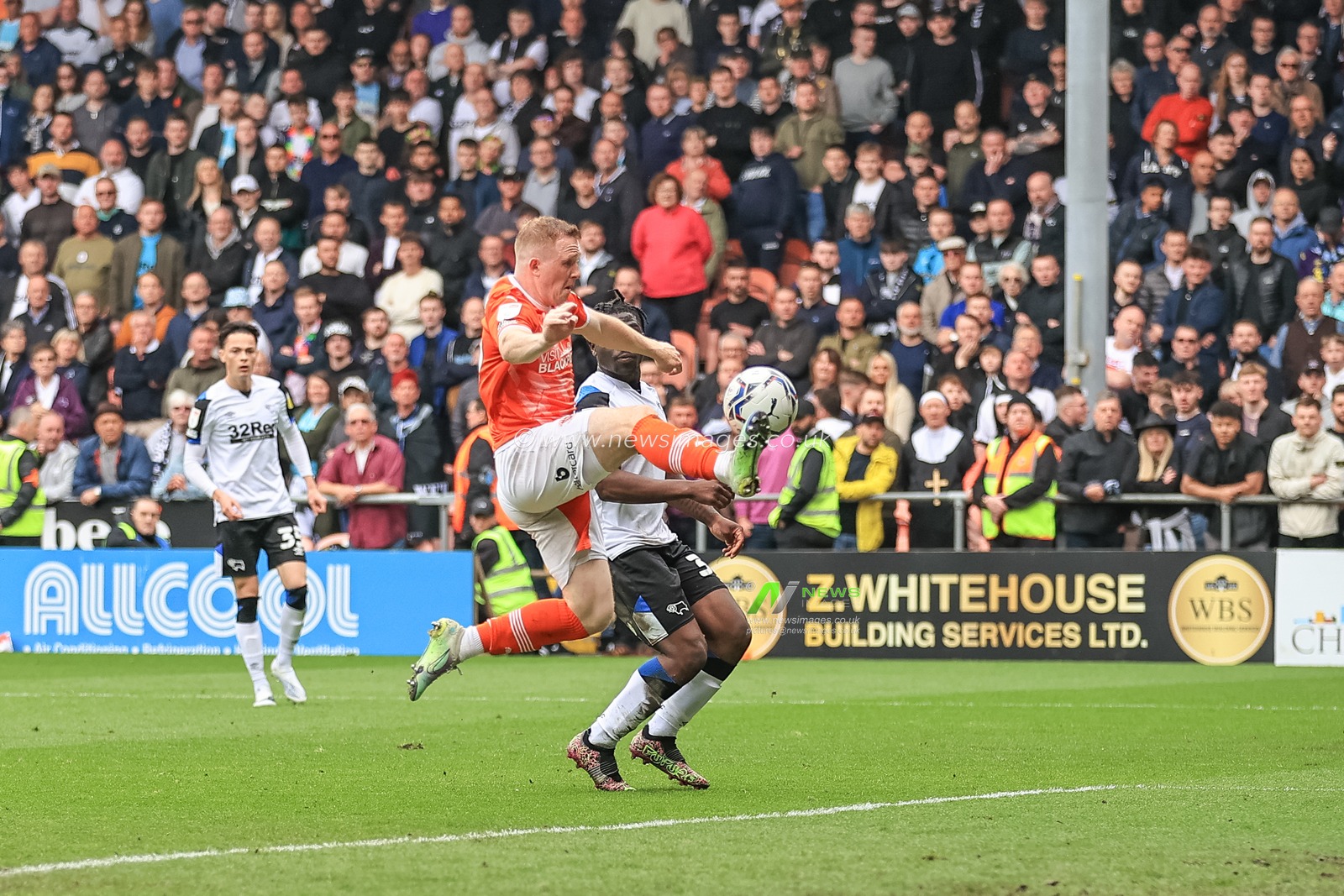 Shayne Lavery #19 of Blackpool with an attempt on goal