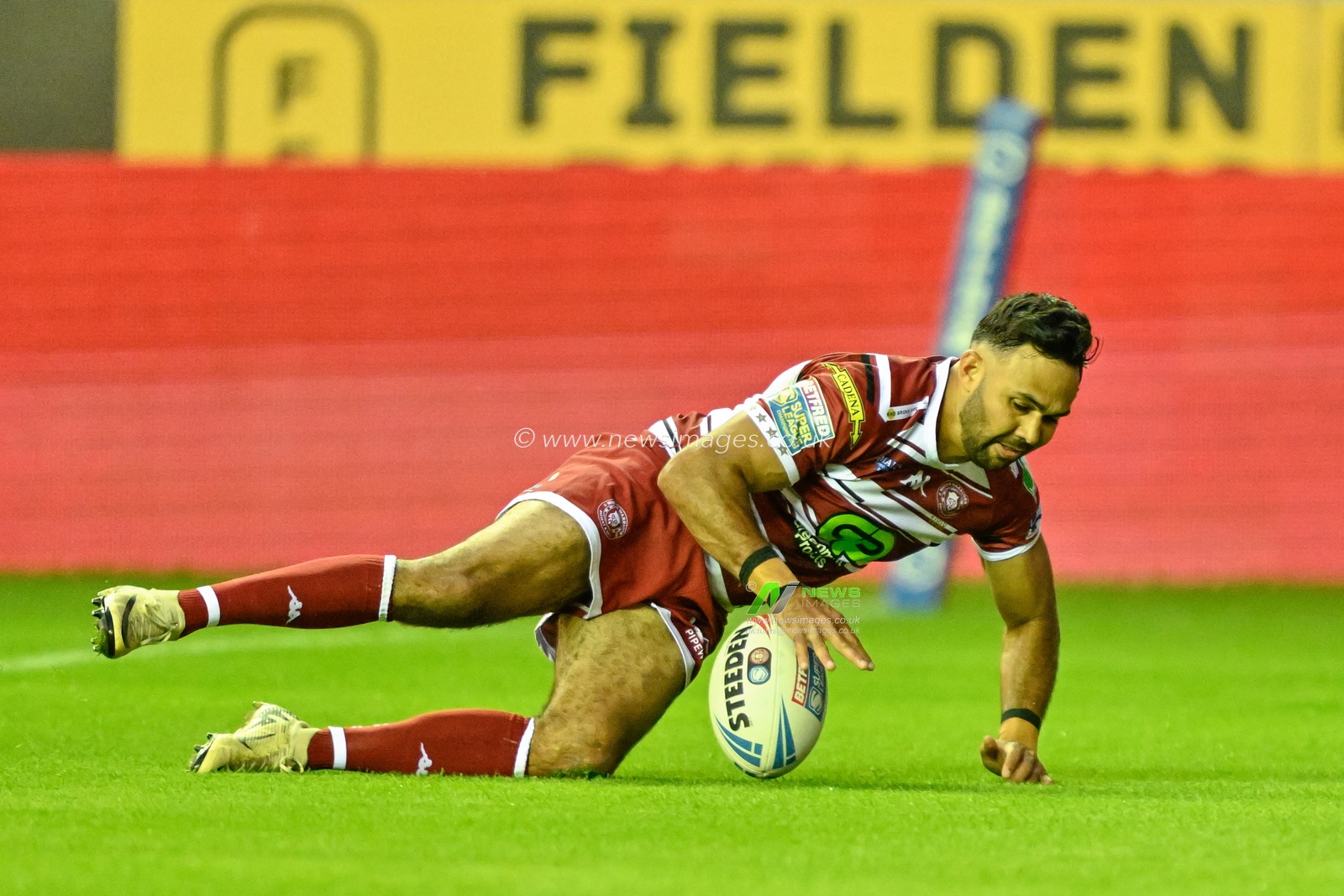 Bevan French of Wigan Warriors goes over for a try to make it 16-6 Wigan during the Betfred Super League Round 16 match Wigan Warriors vs Leigh Leopards at DW Stadium, Wigan, United Kingdom, 5th July 2024

(Photo by Cody Froggatt/News Images)