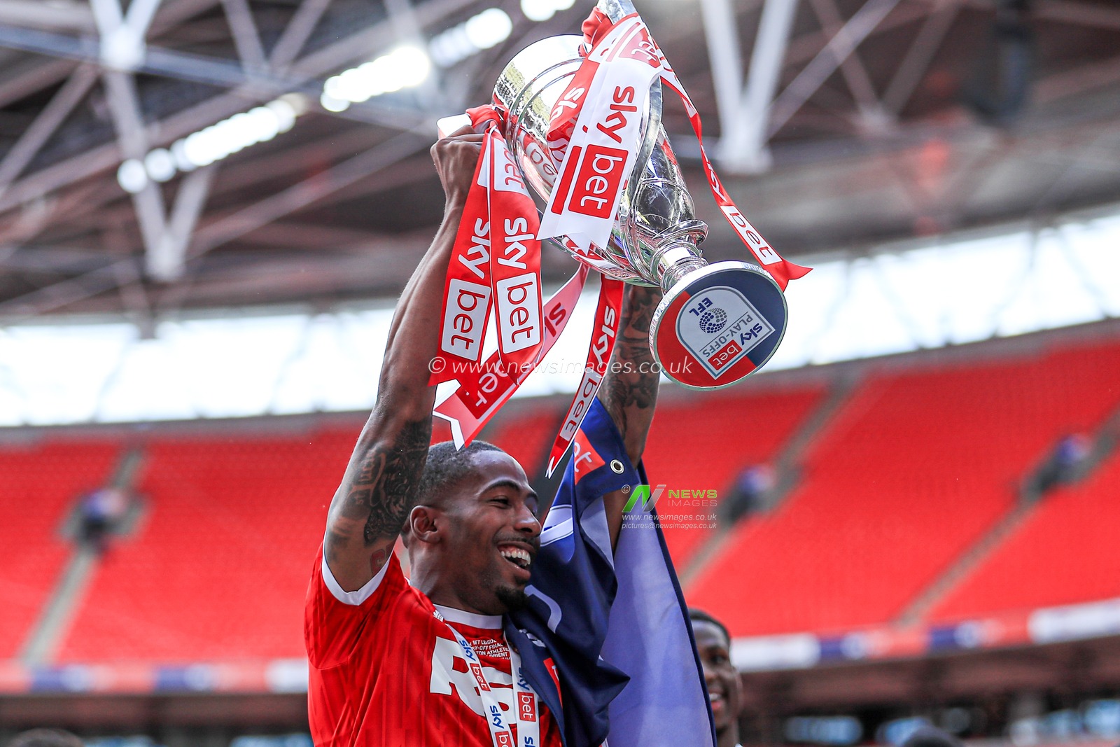 Kayne Ramsay of Charlton Athletic celebrate getting promotion back to the Sky Bet Championship after the Sky Bet League 1 Playoff Final match Charlton Athletic vs Leyton Orient at Wembley Stadium, London, United Kingdom, 25th May 2025

(Photo by Jorge Horsted/News Images)