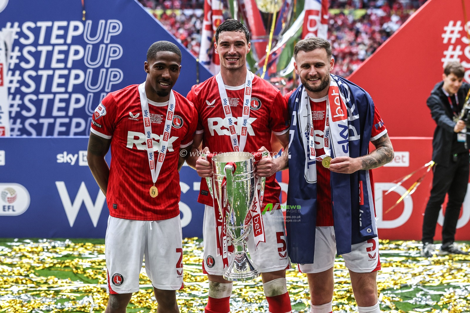 Kayne Ramsay of Charlton Athletic, Lloyd Jones of Charlton Athletic and Macaulay Gillesphey of Charlton Athletic pose with the trophy during the Sky Bet League 1 Playoff Final match Charlton Athletic vs Leyton Orient at Wembley Stadium, London, United Kingdom, 25th May 2025

(Photo by Alfie Cosgrove/News Images)