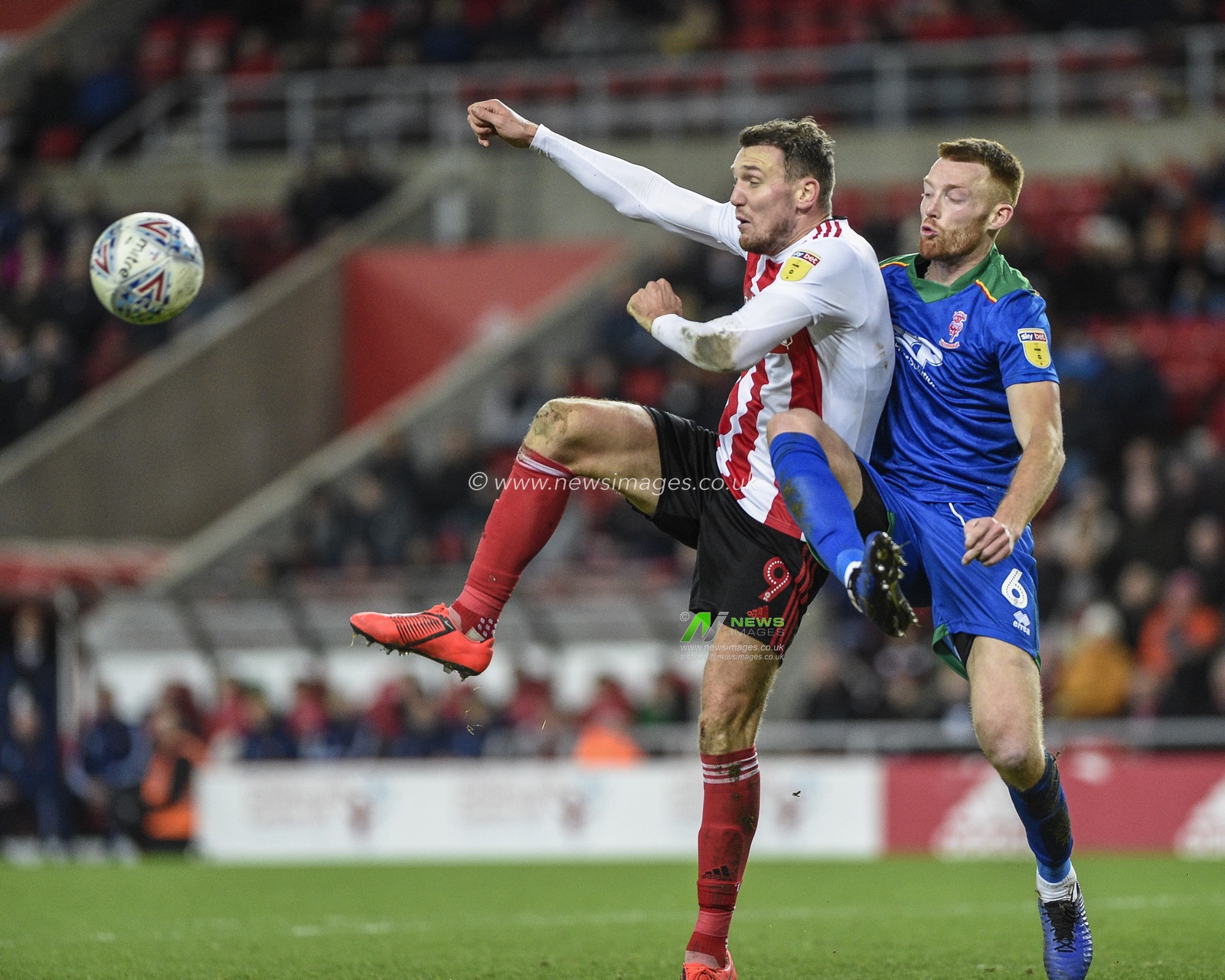 4th January 2020, Stadium Of Light, Sunderland, England; Sky Bet League 1, Sunderland v Lincoln City : Charlie Wyke (9) of Sunderland battles for possession with Cian Bolger (6) of Lincoln City

Credit: Iam Burn/News Images